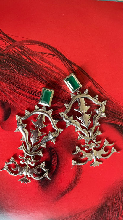bold sterling silver statement earring set in very unique design. handcrafted in sterling silver. and studded with green onyx stone which is a semi precious stone and zircon stones.
